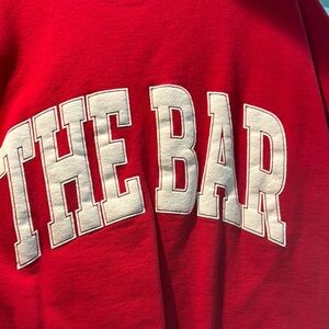 The Bar varsity sweatshirt, size large.